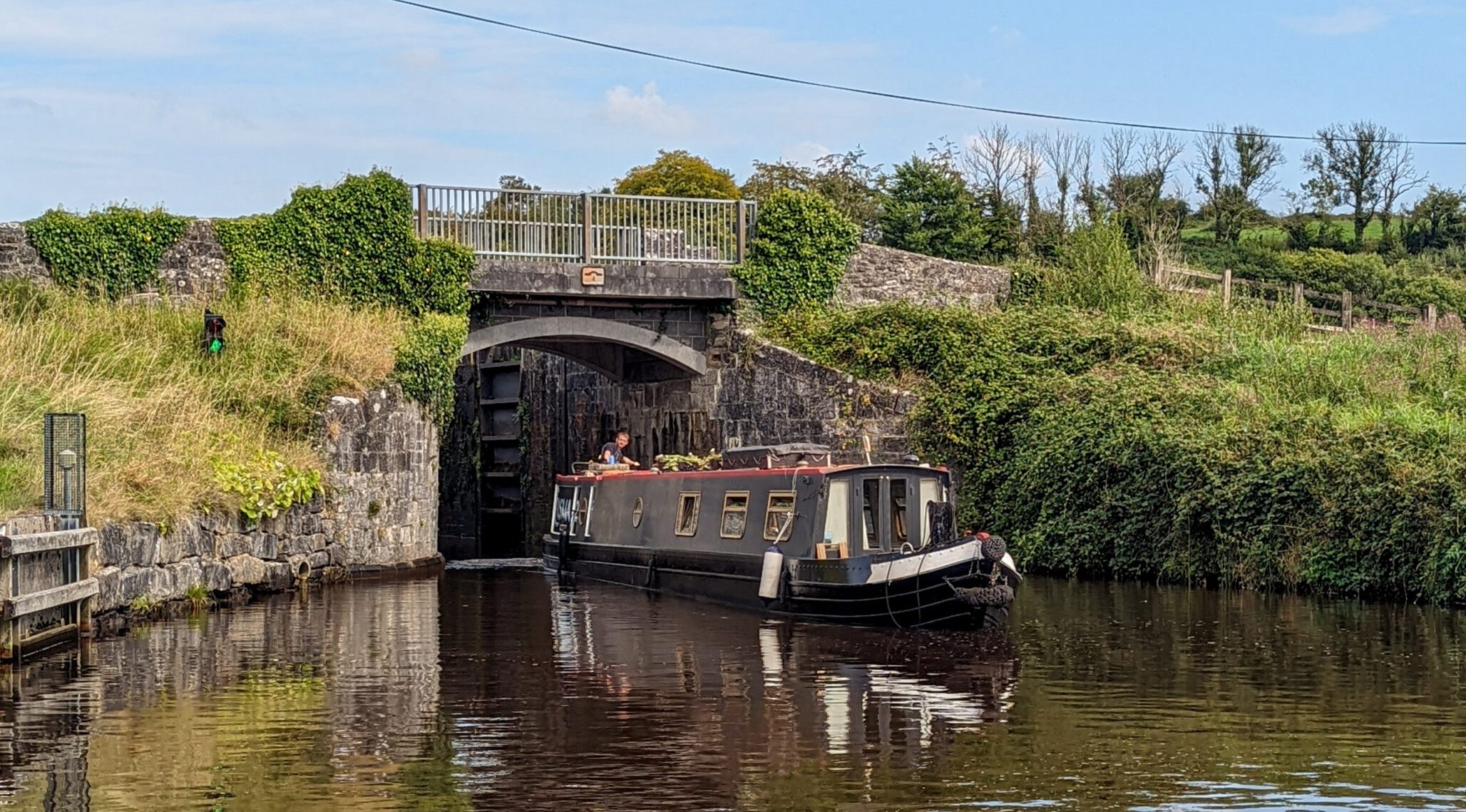 Narrowboat Exterior Going Through Bridge on Shannon Waterways - FAQs Page